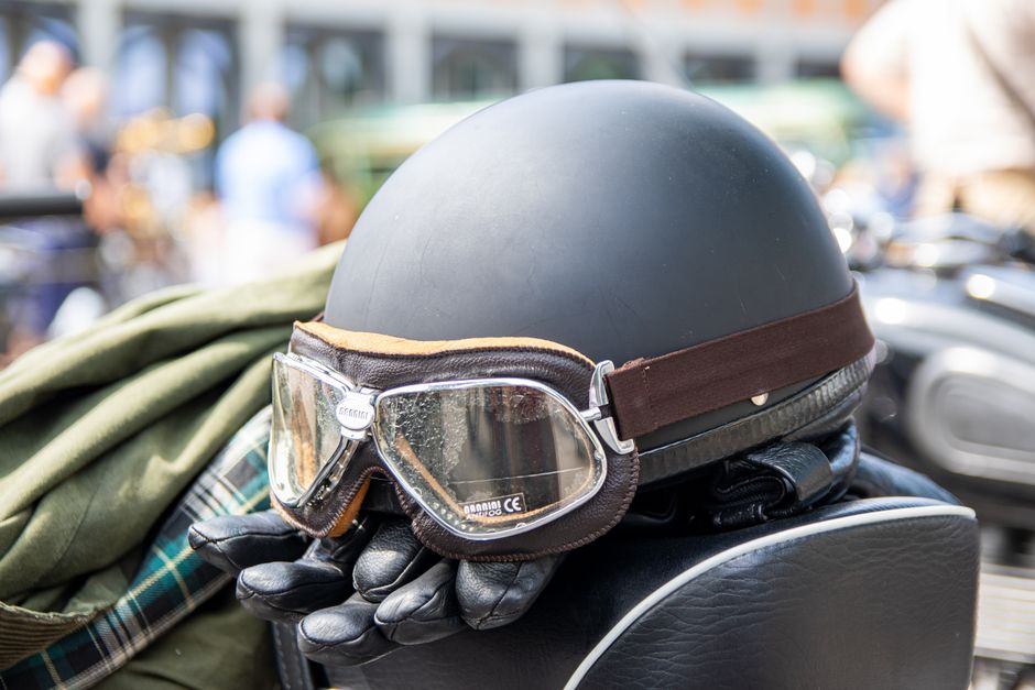 Closeup of a retro leather helmet with goggles on a motorbike, Karlsruhe.